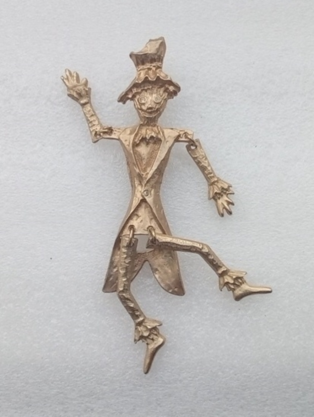 Vintage Gold Tone Articulated Scarecrow Brooch Featuring Movable Arms And Legs